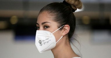 0_a-local-airlines-employee-wears-a-mask-to-prevent-a-spread-of-the-coronavirus-at-el-alto-internati.jpg